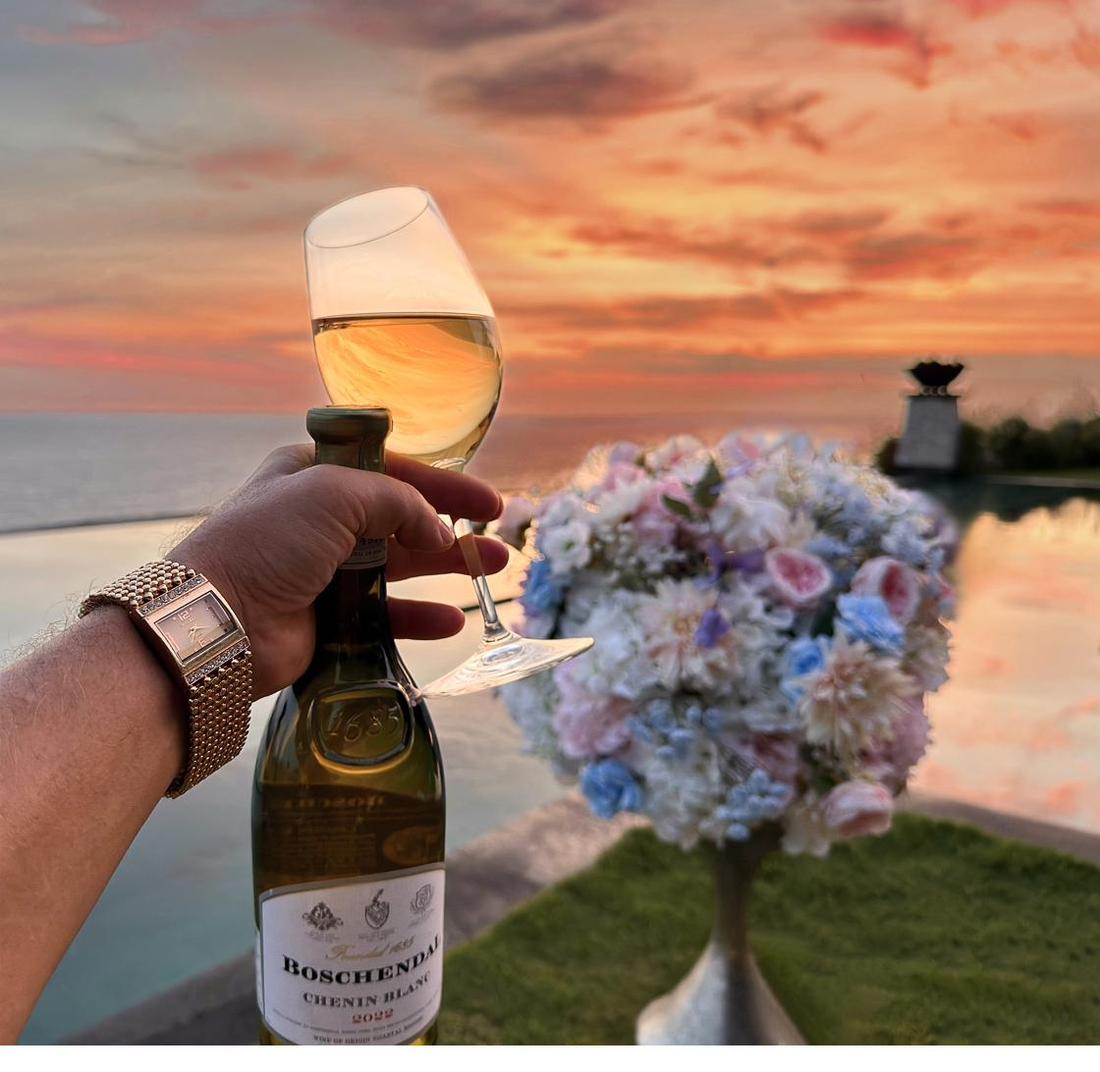 Boschendal wine at sunset Rockfish Cliffside Bali